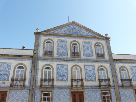 A building decorated with traditional azulejo tiles