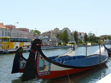 Canalside in Aveiro - needless to say, boat trips and tourists feature prominently, but it's very attractive and well kept