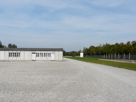 Parade area with accommodation hut in background