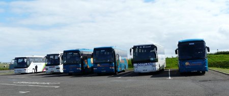 Row of coaches parked at John O'Groats