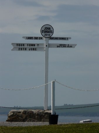 Mileage sign at John O'Groats