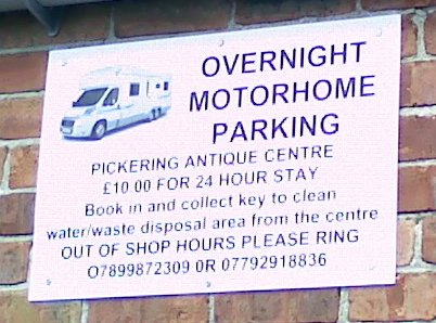 Sign for overnight motorhome parking at Pickering Antique Centre