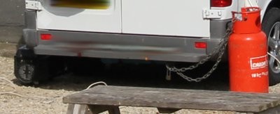 Generator and gas cylinder by motorhome parked on Marine Drive, Scarborough