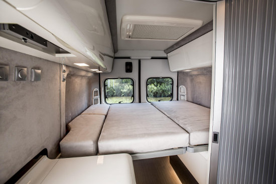 Fiat Ducato expedition camper inside with bed down